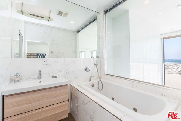 Bathroom, Dual Sink Vanities, Glass Shower, Interior, Marble Walls, Recessed Lighting, Water
