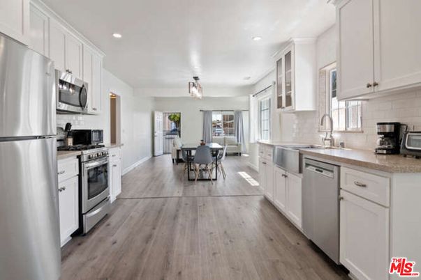 Dining room, Interior, Kitchen, Recessed Lighting, Stainless Steel Appliances, Wood Texture Flooring