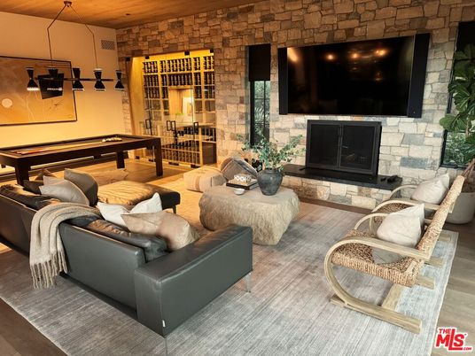 Billiard Table, Fireplace, Game Room, Interior, Living room, Pendant Lights, Stone Walls
