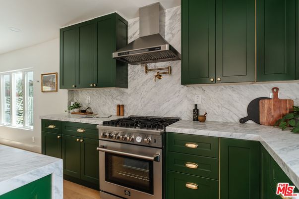 Interior, Kitchen, Marble Walls, Recessed Lighting, Stainless Steel Appliances, Wood Texture Flooring