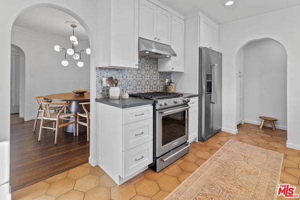 Dining room, Interior, Kitchen, Pendant Lights, Recessed Lighting, Stainless Steel Appliances, Wood Texture Flooring