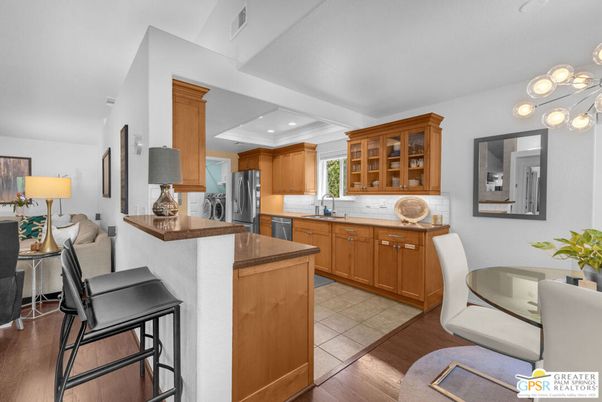 Dining room, Interior, Kitchen, Recessed Lighting, Stainless Steel Appliances, Wood Texture Flooring