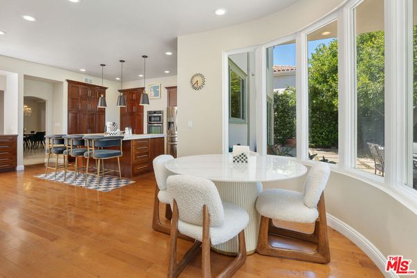 Dining room, Interior, Kitchen, Pendant Lights, Recessed Lighting, Stainless Steel Appliances, Wood Texture Flooring