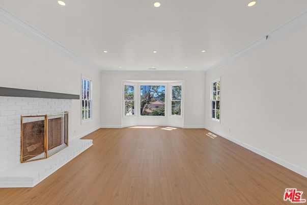 Empty room, Fireplace, Interior, Recessed Lighting, Wood Texture Flooring