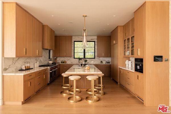 Interior, Kitchen, Marble Walls, Pendant Lights, Recessed Lighting, Stainless Steel Appliances, Wood Texture Flooring