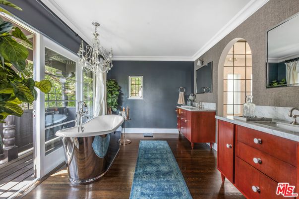 Bathroom, Chandelier, Dual Sink Vanities, Free Standing Baths, Interior, Wood Texture Flooring
