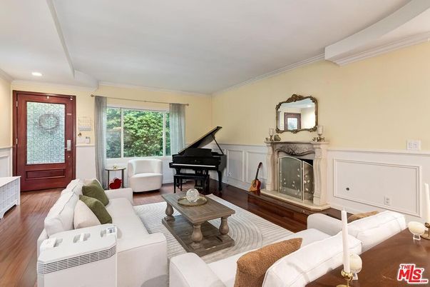 Fireplace, Interior, Living room, Piano, Recessed Lighting, Wood Texture Flooring