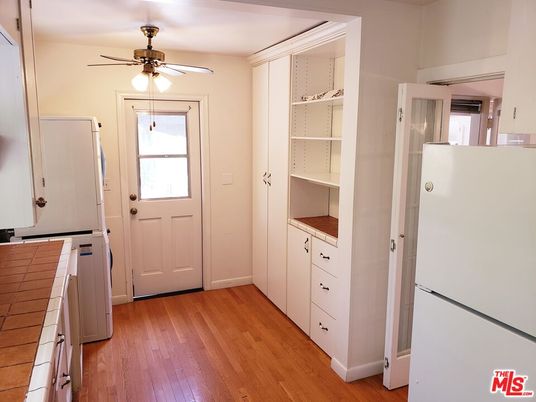 Interior, Kitchen, Tile Countertops, Wood Texture Flooring