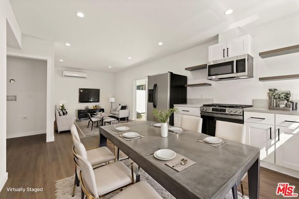 Dining room, Interior, Kitchen, Living room, Recessed Lighting, Stainless Steel Appliances, Wood Texture Flooring
