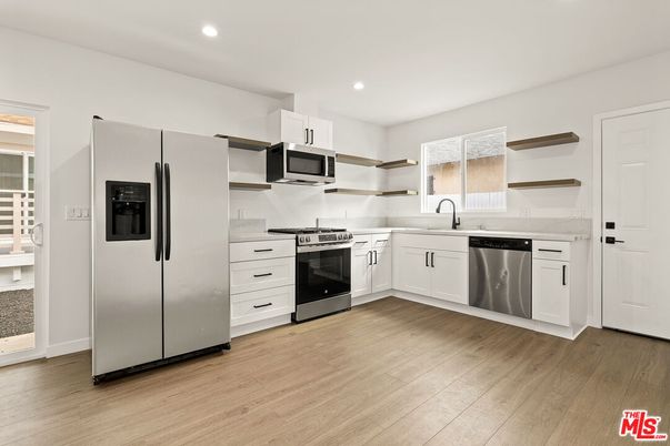 Interior, Kitchen, Recessed Lighting, Stainless Steel Appliances, Wood Texture Flooring