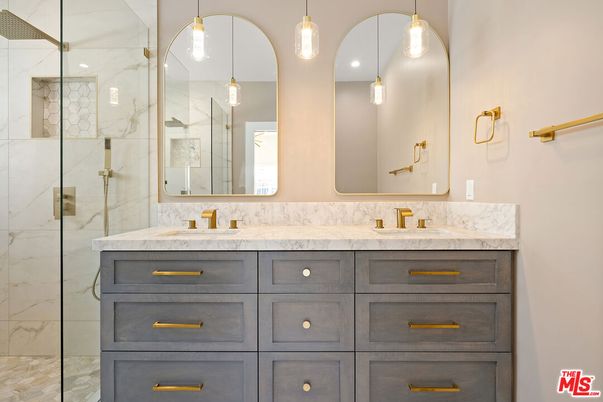 Bathroom, Dual Sink Vanities, Glass Shower, Interior, Marble Walls, Pendant Lights