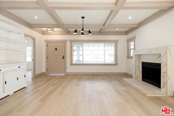 Empty room, Fireplace, Interior, Pendant Lights, Recessed Lighting, Wood Texture Flooring