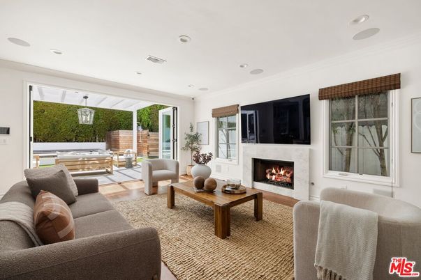 Dining room, Fireplace, Interior, Living room, Pendant Lights, Recessed Lighting, Wood Texture Flooring