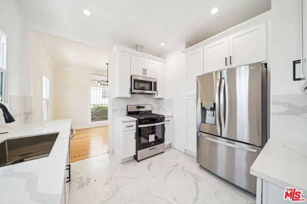Interior, Kitchen, Marble, Pendant Lights, Recessed Lighting, Stainless Steel Appliances