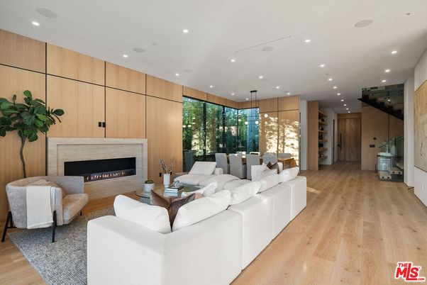 Dining room, Fireplace, Interior, Living room, Pendant Lights, Recessed Lighting, Wood Texture Flooring, Wooden Walls