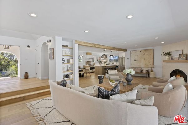 Dining room, Fireplace, Interior, Living room, Pendant Lights, Recessed Lighting, Wood Texture Flooring