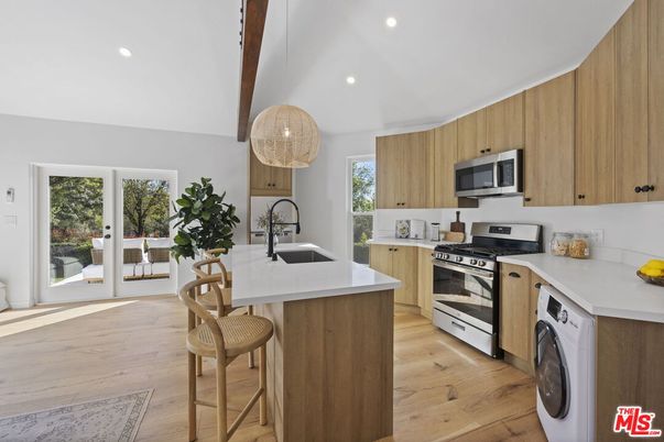 Interior, Kitchen, Recessed Lighting, Stainless Steel Appliances, Washer, Wooden Beams, Wood Texture Flooring
