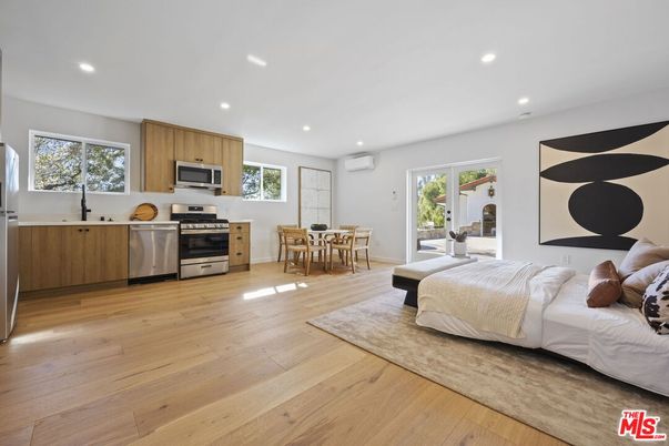 Bedroom, Dining room, Interior, Kitchen, Recessed Lighting, Stainless Steel Appliances, Wood Texture Flooring
