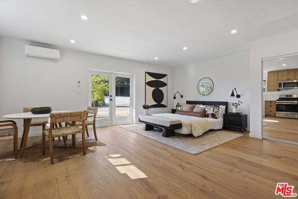 Bedroom, Dining room, Interior, Kitchen, Recessed Lighting, Stainless Steel Appliances, Wood Texture Flooring