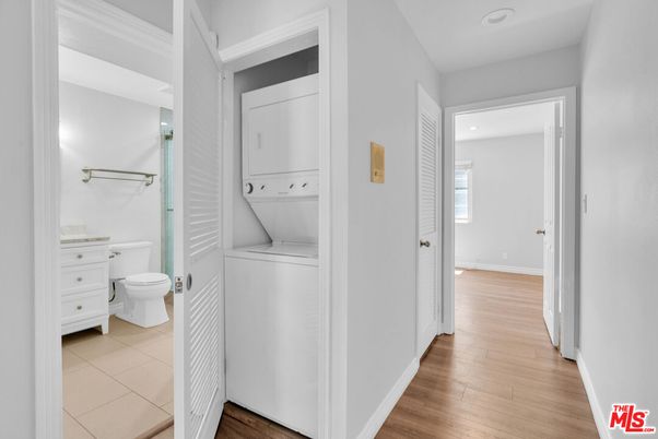 Bathroom, Interior, Recessed Lighting, Utility Closets, Washer, Wood Texture Flooring