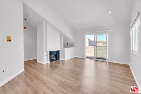 Empty room, Fireplace, Interior, Pendant Lights, Recessed Lighting, Wood Texture Flooring