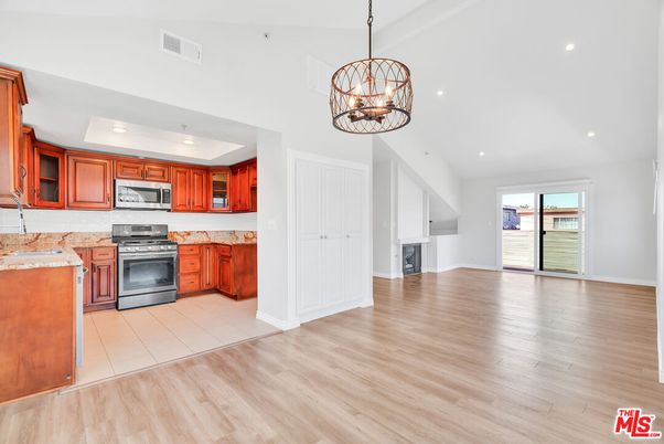 Chandelier, Interior, Kitchen, Pendant Lights, Recessed Lighting, Stainless Steel Appliances, Wood Texture Flooring