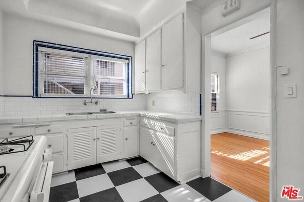 Interior, Kitchen, Tile Countertops, Wood Texture Flooring