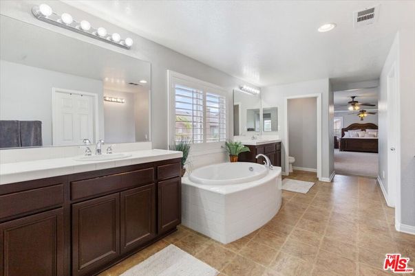 Bathroom, Dual Sink Vanities, Interior, Recessed Lighting, Tile Countertops