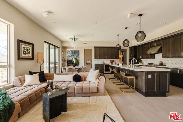 Chandelier, Dining room, Interior, Kitchen, Living room, Pendant Lights, Recessed Lighting, Stainless Steel Appliances, Wood Texture Flooring