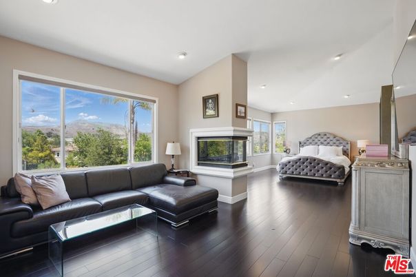 Bedroom, Fireplace, Interior, Living room, Recessed Lighting, Wood Texture Flooring