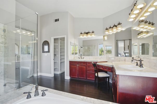 Bathroom, Dual Sink Vanities, Glass Shower, Interior, Tile Countertops, Wood Texture Flooring