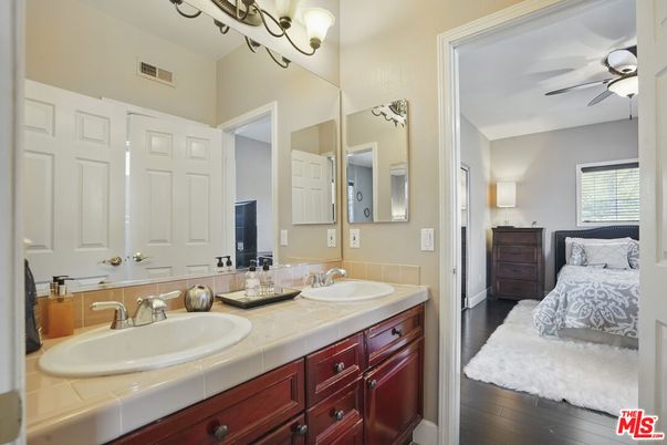 Bathroom, Dual Sink Vanities, Interior, Tile Countertops, Wood Texture Flooring