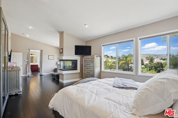 Bedroom, Fireplace, Interior, Recessed Lighting, Wood Texture Flooring