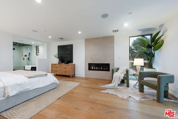 Bedroom, Fireplace, Interior, Recessed Lighting, Wood Texture Flooring