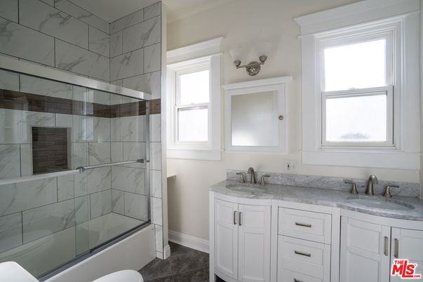 Bathroom, Dual Sink Vanities, Glass Shower, Interior, Marble Walls