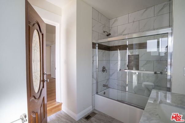 Bathroom, Glass Shower, Interior, Marble Walls, Wood Texture Flooring