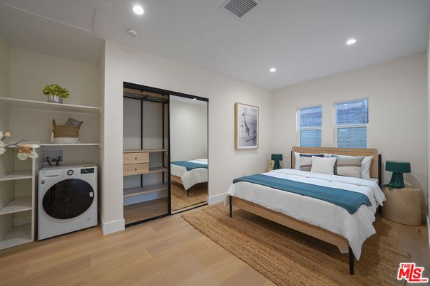 Bedroom, Interior, Recessed Lighting, Washer, Wood Texture Flooring