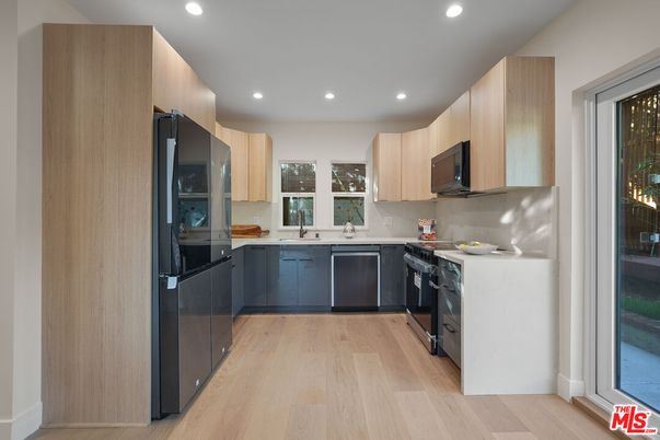Interior, Kitchen, Recessed Lighting, Stainless Steel Appliances, Wood Texture Flooring