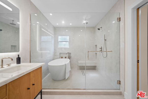 Bathroom, Free Standing Baths, Glass Shower, Interior, Marble Walls, Recessed Lighting