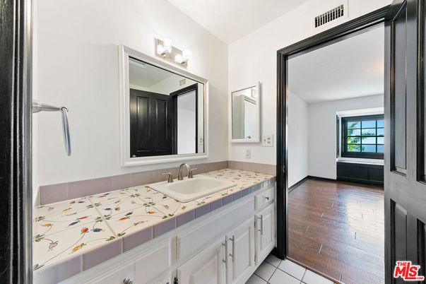 Bathroom, Dual Sink Vanities, Interior, Tile Countertops, Wood Texture Flooring