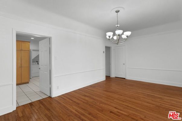 Chandelier, Empty room, Interior, Recessed Lighting, Wood Texture Flooring
