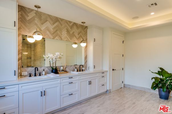 Bathroom, Dual Sink Vanities, Interior, Pendant Lights, Recessed Lighting, Wood Texture Flooring