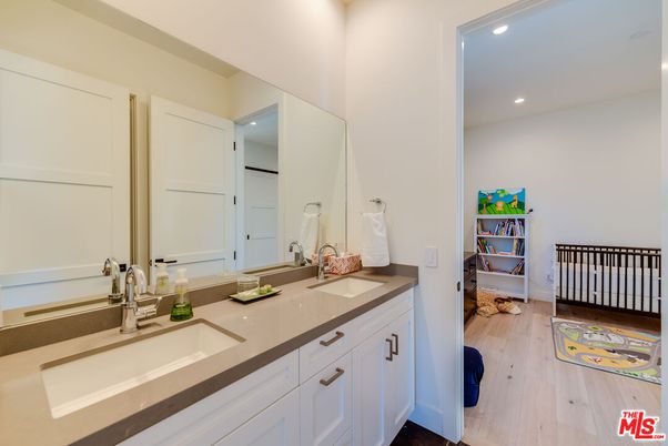 Bathroom, Dual Sink Vanities, Interior, Recessed Lighting, Wood Texture Flooring