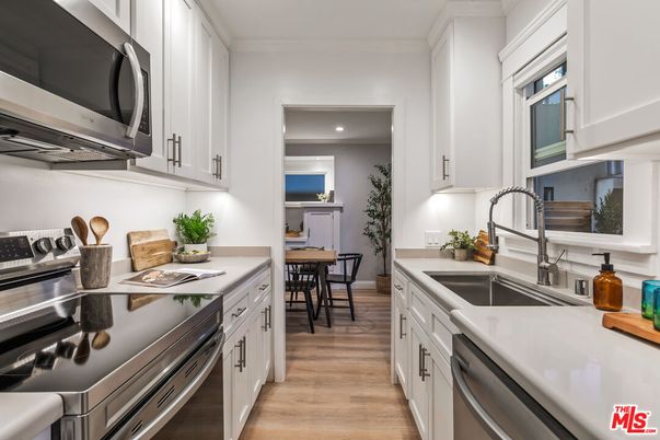 Dining room, Interior, Kitchen, Recessed Lighting, Stainless Steel Appliances, Wood Texture Flooring