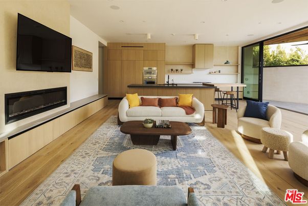 Fireplace, Interior, Kitchen, Living room, Pendant Lights, Recessed Lighting, Stainless Steel Appliances, Wood Texture Flooring
