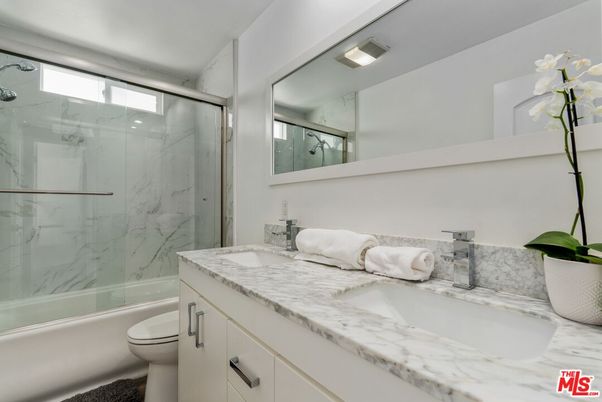 Bathroom, Dual Sink Vanities, Glass Shower, Interior, Marble Walls