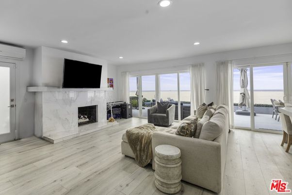 Fireplace, Interior, Living room, Recessed Lighting, Water, Wood Texture Flooring