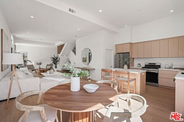 Dining room, Interior, Kitchen, Living room, Recessed Lighting, Stainless Steel Appliances, Wood Texture Flooring