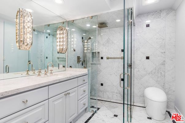 Bathroom, Dual Sink Vanities, Glass Shower, Interior, Marble, Marble Walls, Recessed Lighting