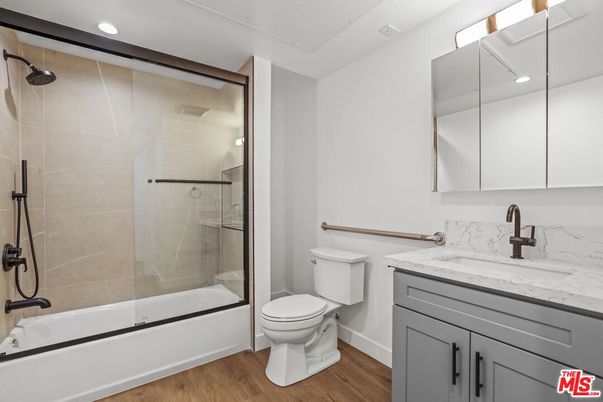 Bathroom, Glass Shower, Interior, Recessed Lighting, Wood Texture Flooring